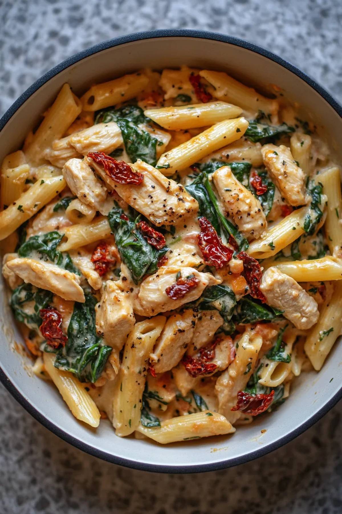 Creamy Chicken Pasta Pot with Spinach and Sun-Dried Tomatoes recipe photo